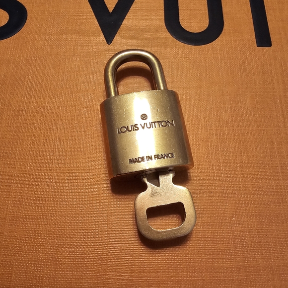 Louis Vuitton Gold Padlock with Key - Picture 3 of 7